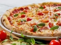 Η ιστορία της πίτσας: Πως πήρε το όνομά της και τις διάφορες μορφές της